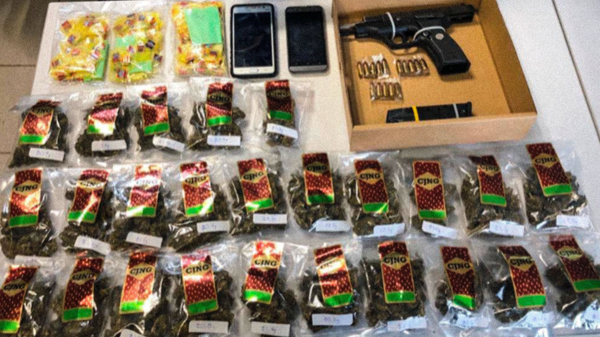 CJNG weapons and drugs seized in Irapuato.  Marijuana is sold in packages with the initials of the cartel.
